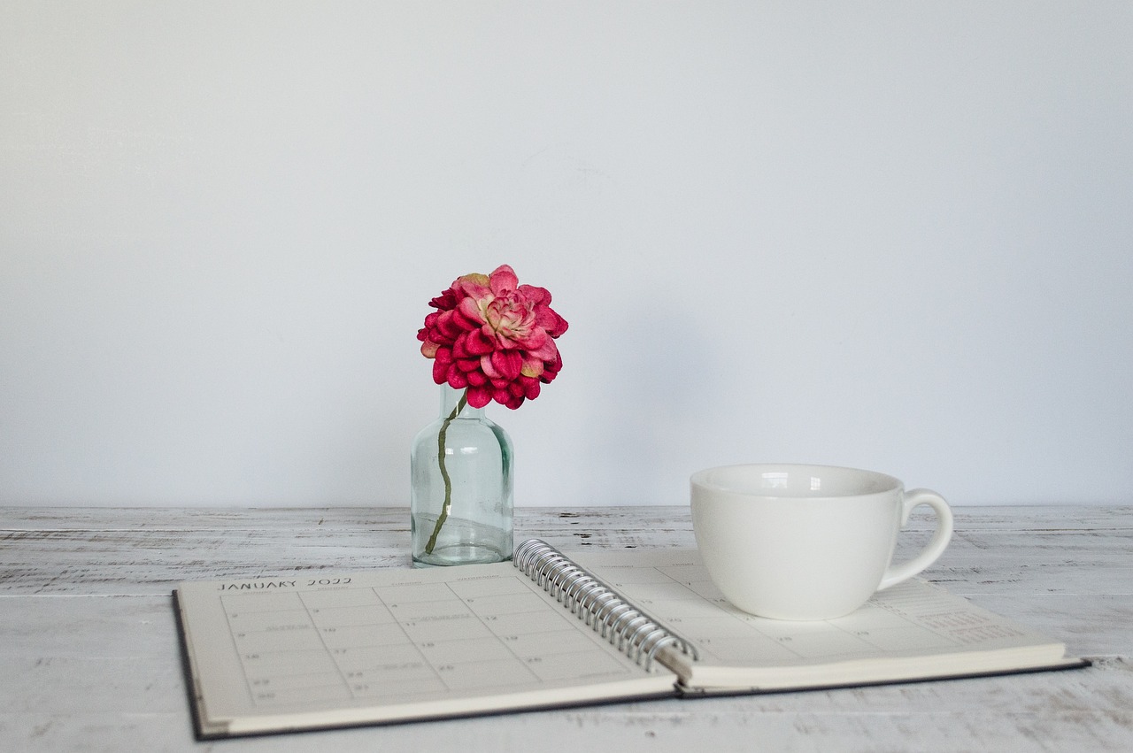 planning journal and flower